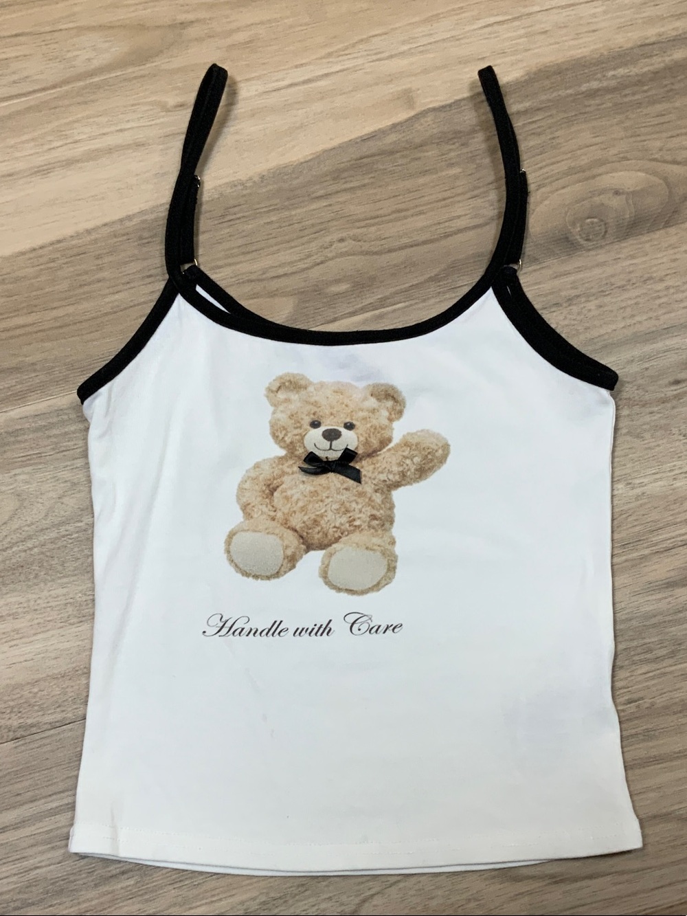 Edikted White Cami with Beige Teddy Graphic and Black Trim